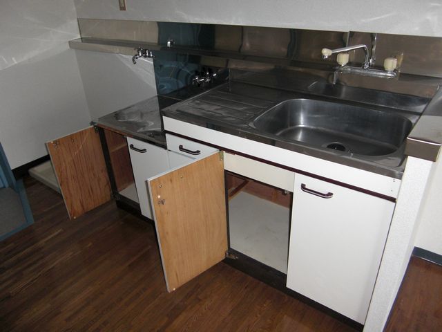 Living and room. There is of course housed under the kitchen