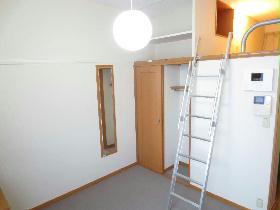 Living and room. It is a loft with a room