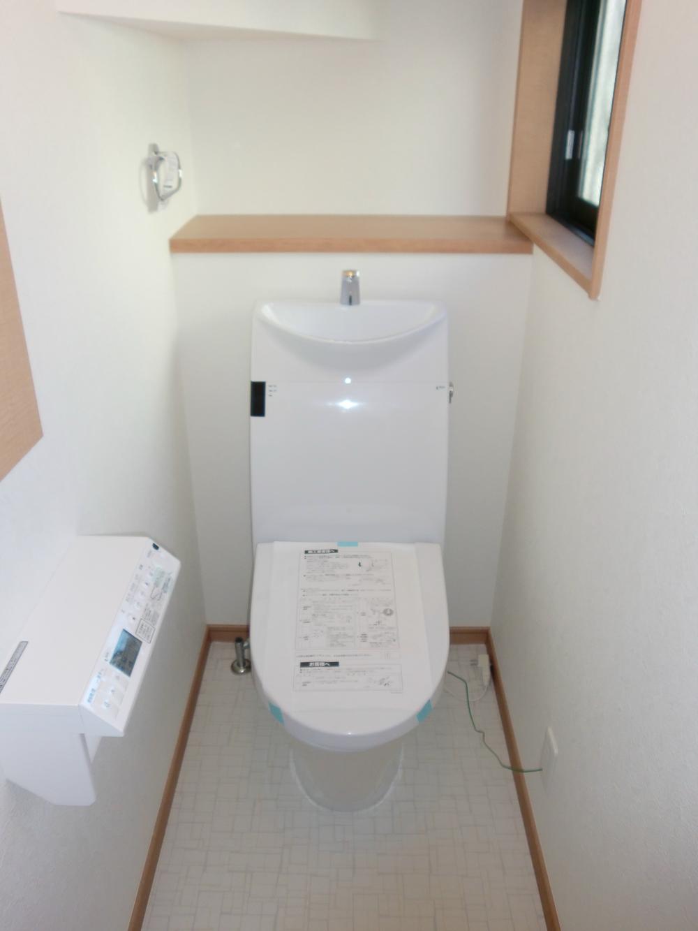 Toilet. With auto-function remote control Washlet