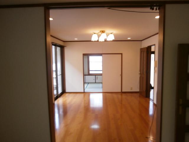 Living. Looking at the living and the Japanese-style room from the kitchen