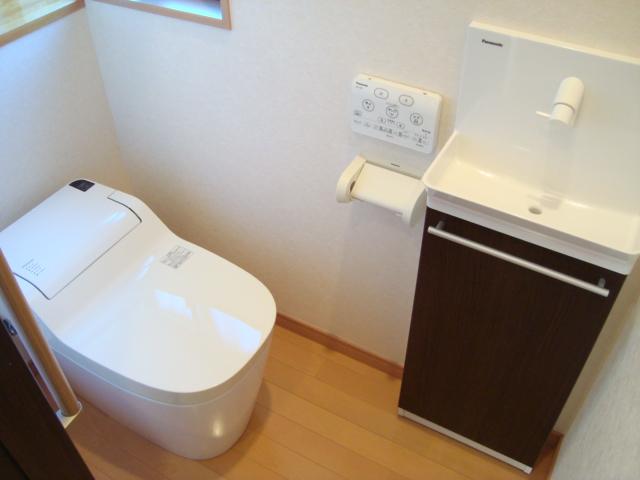 Toilet. Toilet bowl is already cleaning. There is also a separate hand-washing
