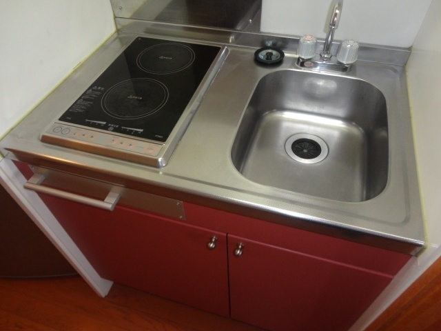 Kitchen. Glass top two-burner stove with
