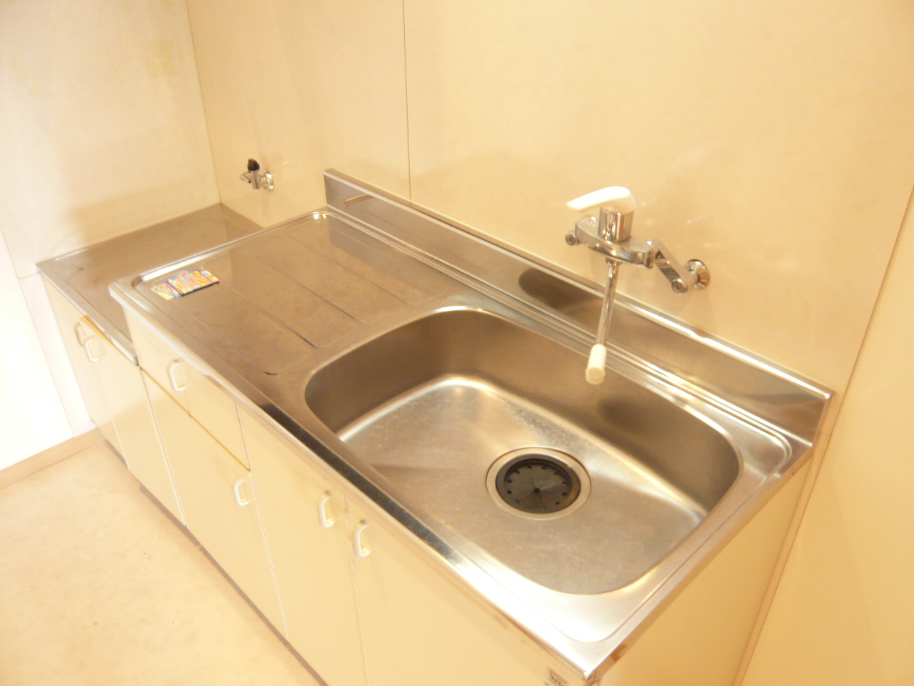 Kitchen. Sink, It has been cleaned shiny. 