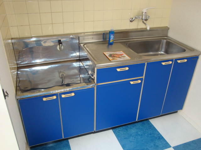Kitchen. Color scheme great with floor.