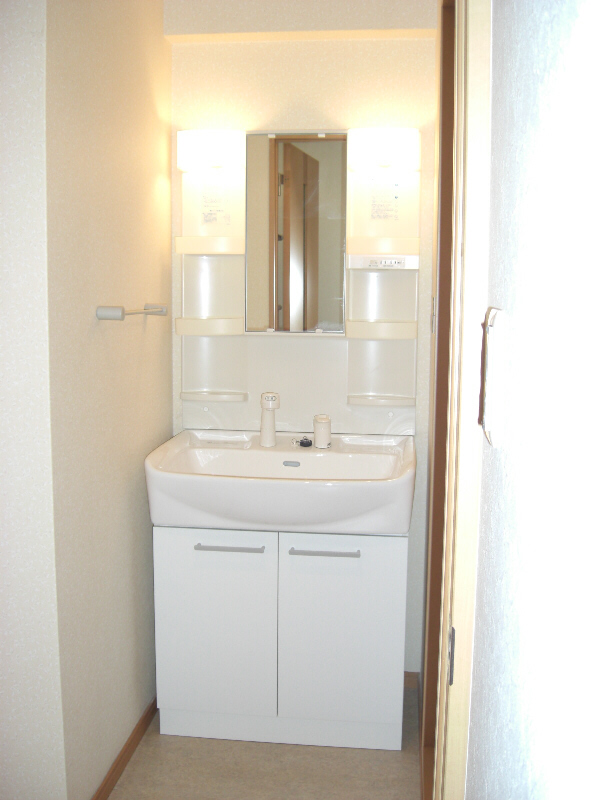 Washroom. Wash basin with a clean sense of the white tones