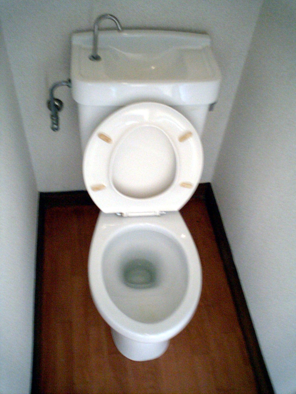 Toilet. With ventilation fan