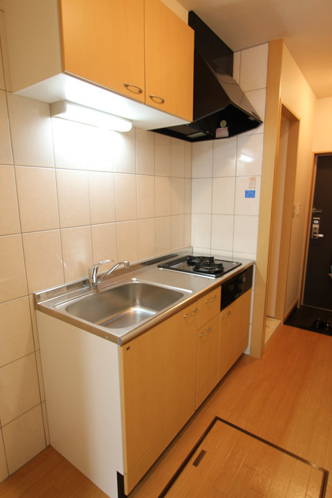 Kitchen. Gas stove available is not required in the system kitchen.