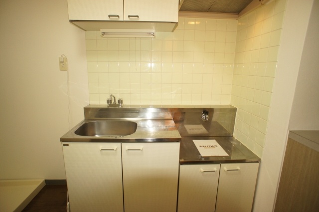Kitchen. Spacious kitchen with hood exhaust fan
