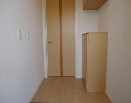 Entrance. With a shoe box