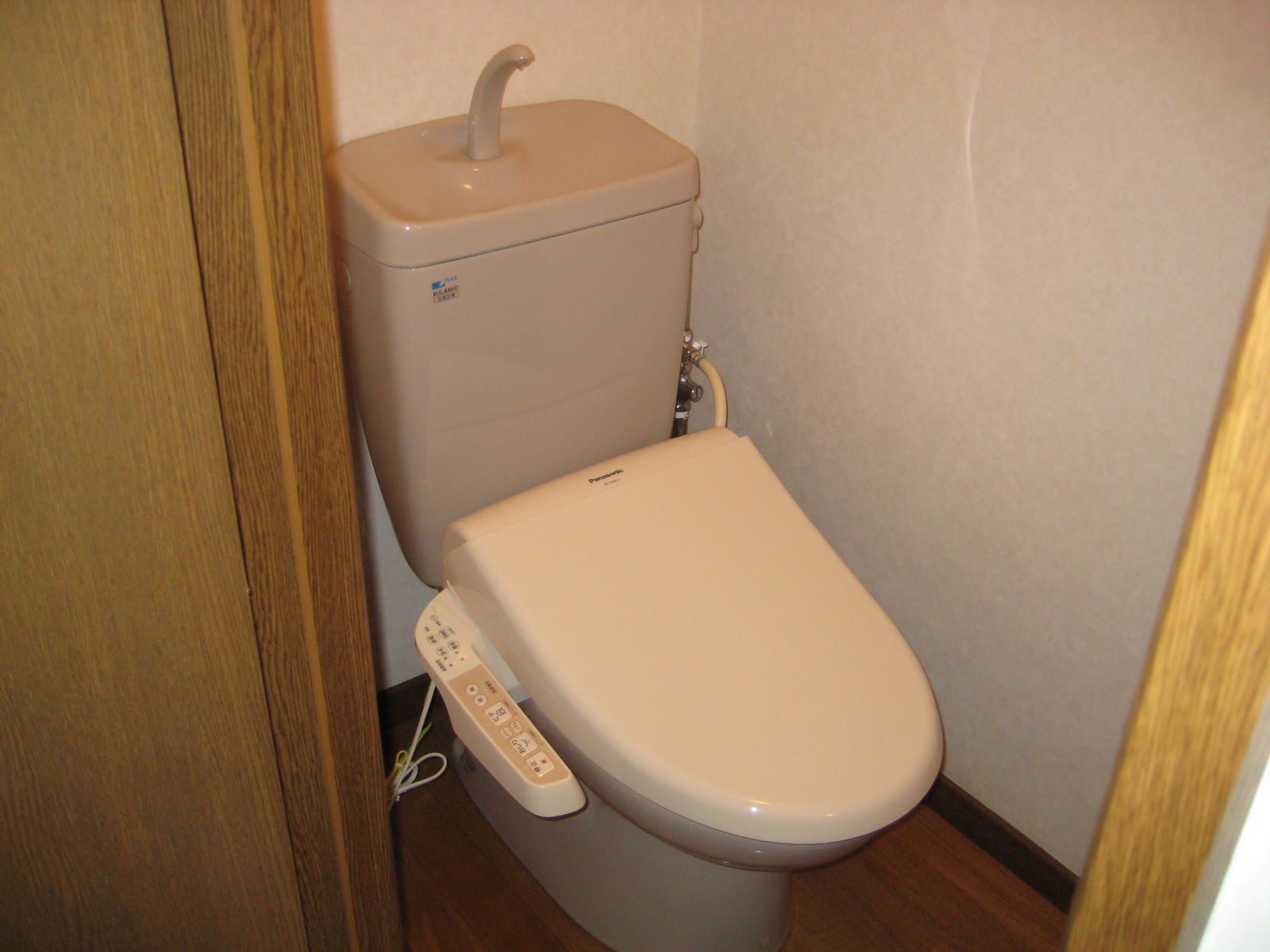 Toilet. It is comfortable with a warm water washing toilet seat.