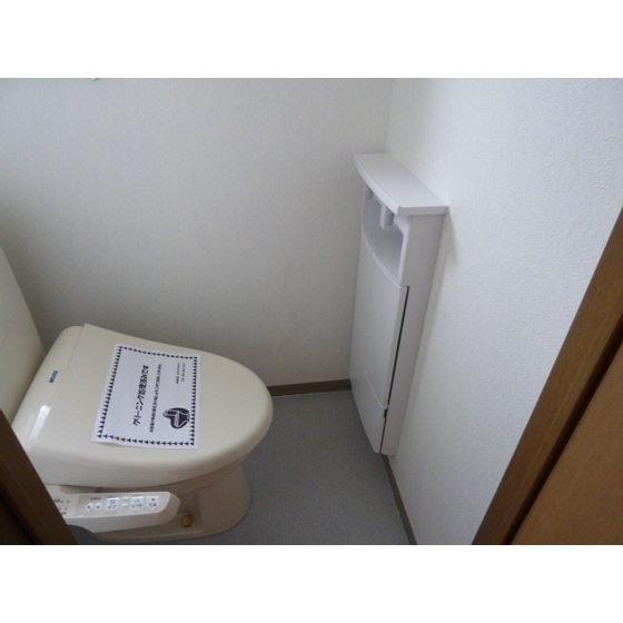 Toilet. Warm water washing toilet seat equipped