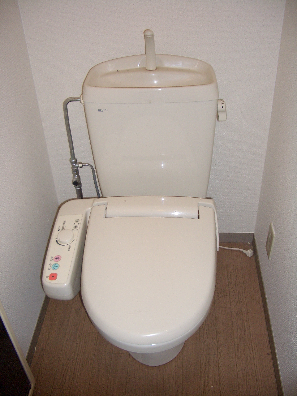 Toilet. It is comfortable in warm water washing toilet seat.