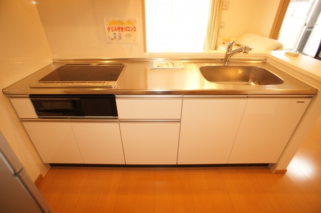 Kitchen. IH system kitchen and living room overlooking counter kitchen