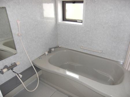 Bath. Spacious Hitotsubo bath with a window with & reheating hot water supply