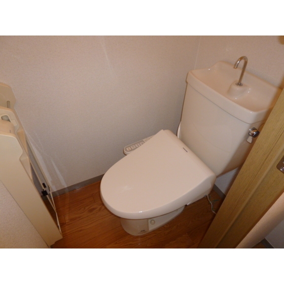 Toilet. Warm water washing toilet seat equipped