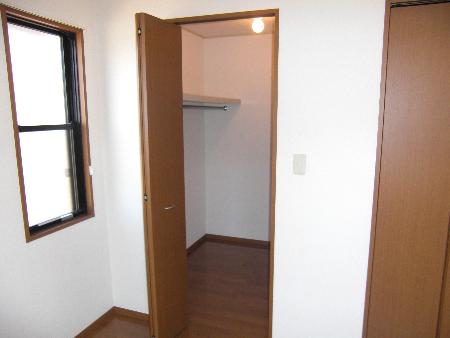 Living and room. Walk-in closet with a Western-style?