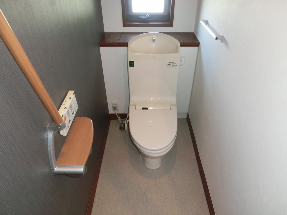 Toilet. Remote control with high-function toilet