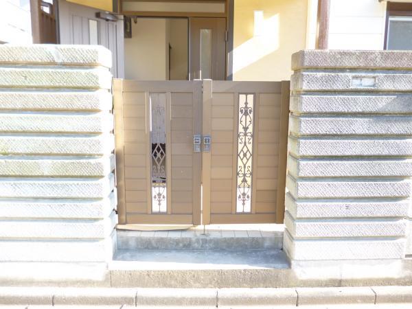 Other local. Entrance is the front of the gate.