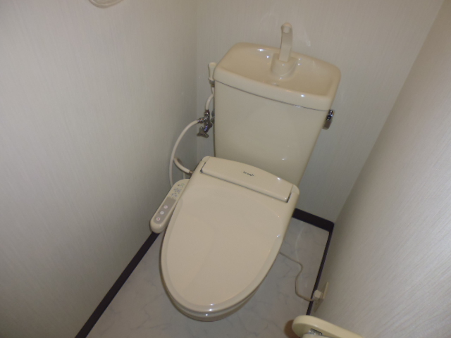 Toilet.  ※ With warm water washing toilet seat