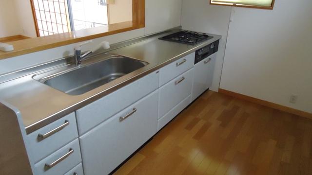 Kitchen. At the counter kitchen, Also you will receive eye to the child who is in the living room.