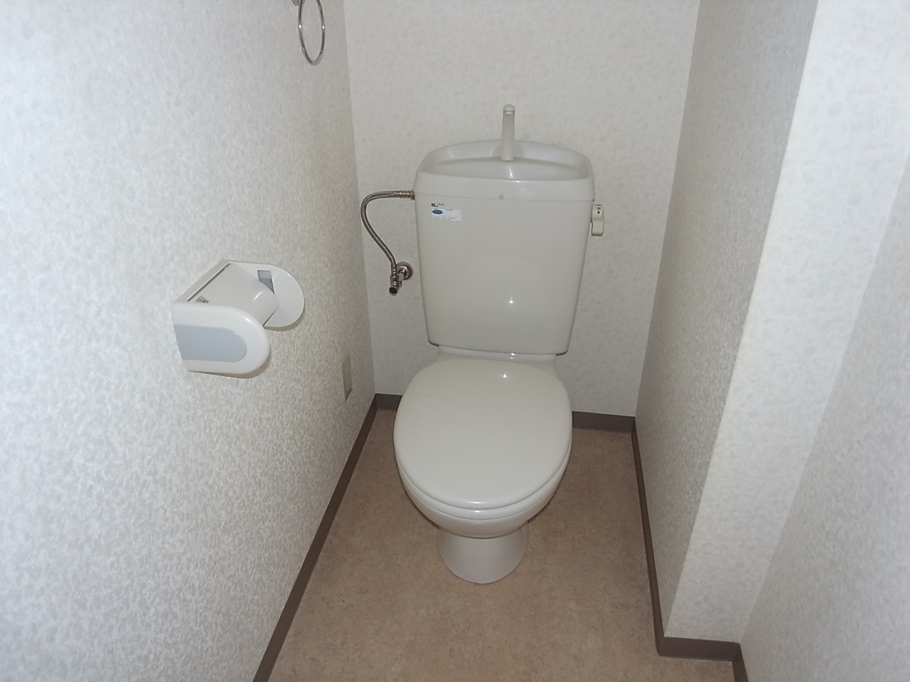 Toilet. It marked with warm water washing toilet seat