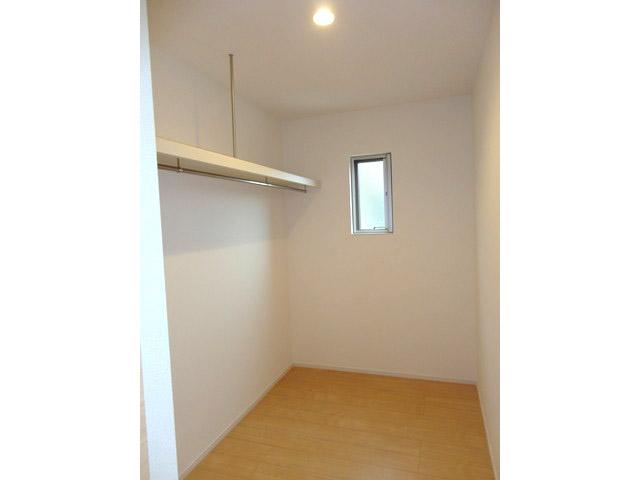 Non-living room. Walk-in closet down