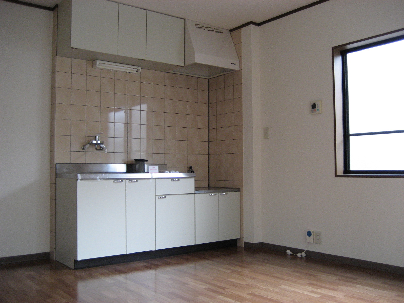 Kitchen. Widely is used wall with kitchen LDK.