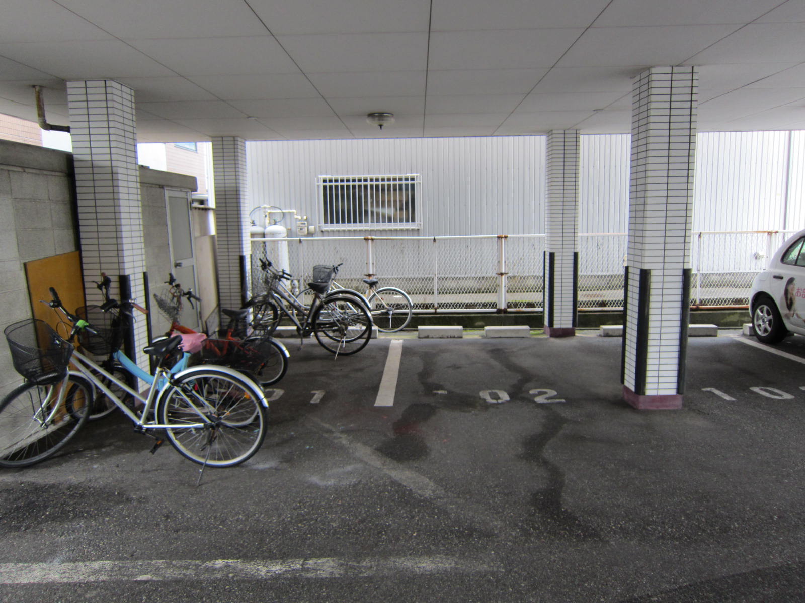 Parking lot. Bicycle parking lot is located at the location of a covered