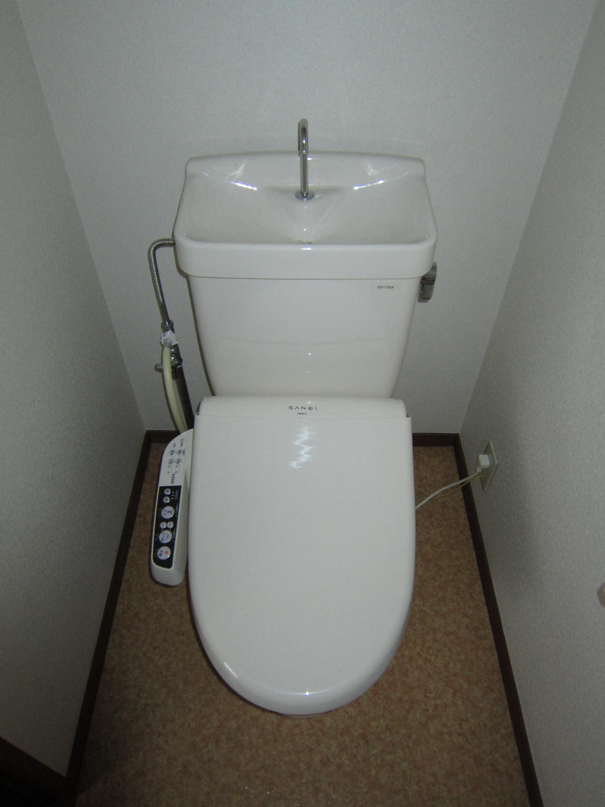 Toilet. Warm water washing toilet seat