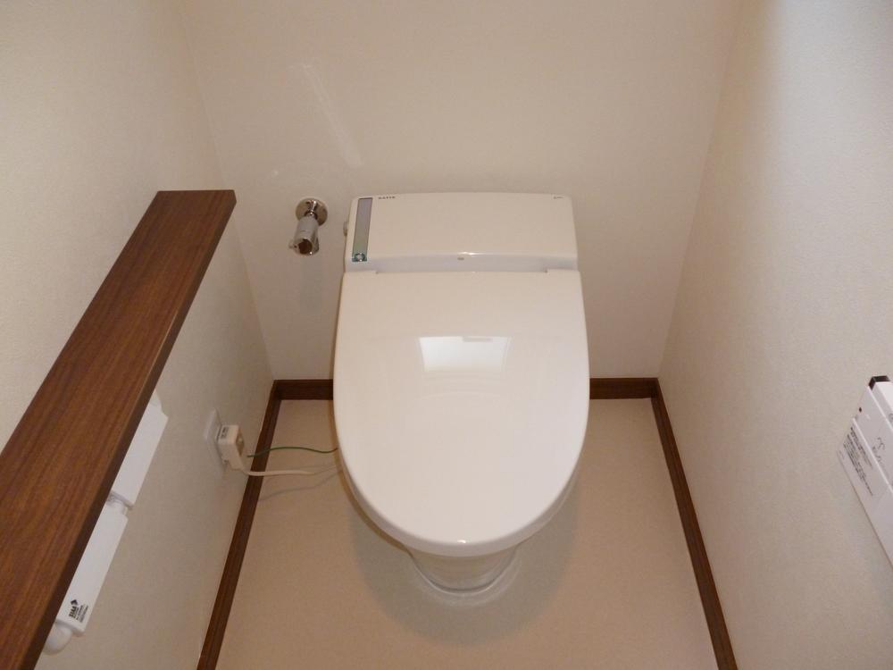 Toilet. INAX made tankless toilet [Satis] The is settled new goods exchange. 