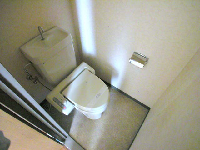 Toilet. Reference is a picture.