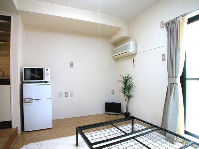 Living and room. It is a photograph of the 1-E, Room.