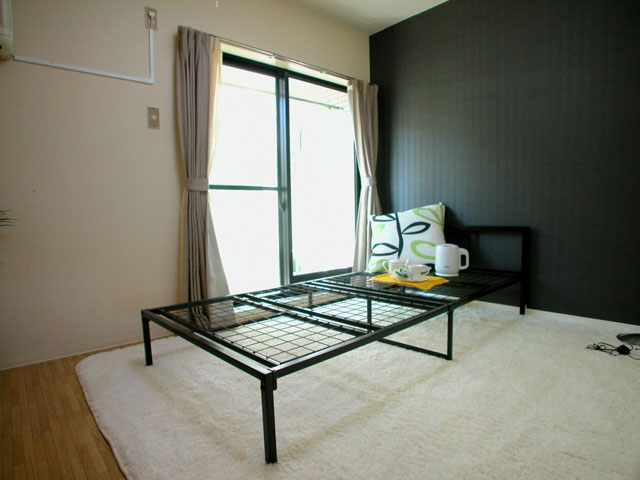 Living and room. It is a photograph of the 1-E, Room.