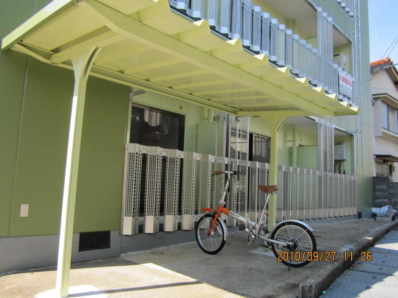 Entrance. Bicycle shed