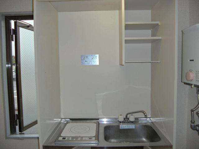 Kitchen. Electric stove ・ It has a small Tsuridana.