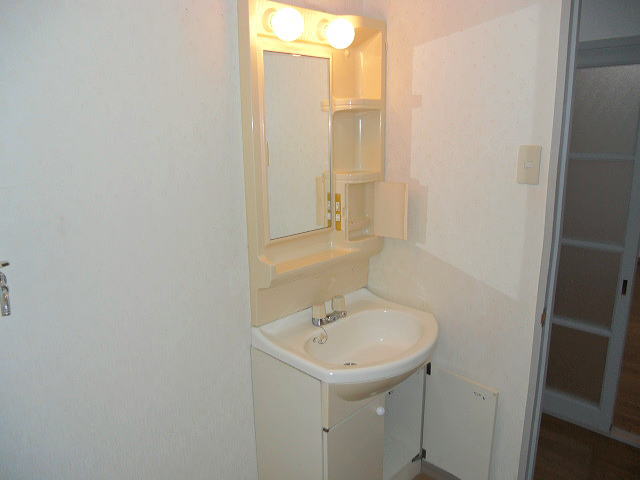 Washroom. Compact is a wash basin.