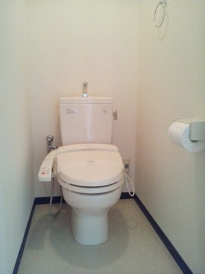 Toilet. Washlet is with