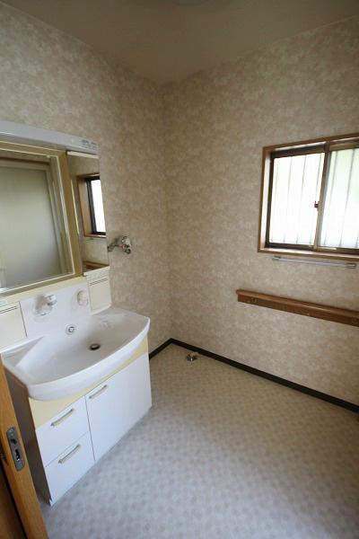 Wash basin, toilet. It is sanitary that cleanliness was a white tones.