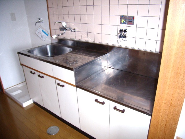Kitchen. It is a photograph of the same type by the room.