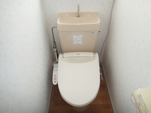 Toilet. It is a toilet with a heated cleaning toilet seat!