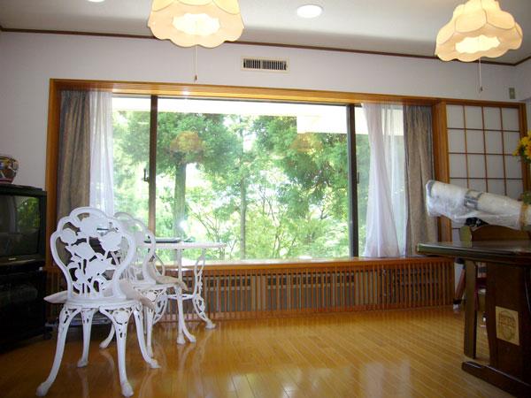 View photos from the dwelling unit. Please enjoy the green from the wide windows.