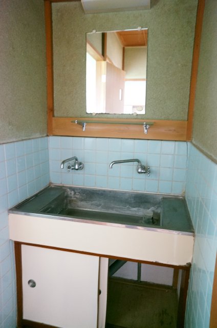 Washroom. Convenient independent wash basin also attached mirror
