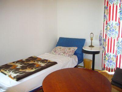 Non-living room. Hall is on the right of the bedroom