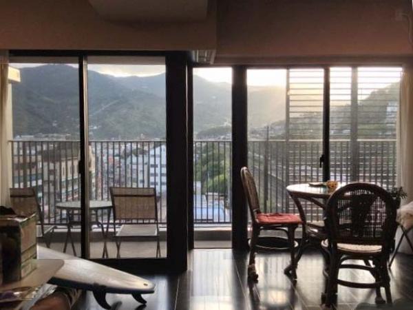 Living. The room is an introduction. Large balcony sash is characteristic 2LDK type of room.