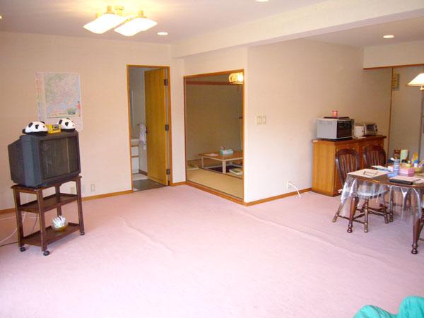 Living. There is a kitchen in the dining room and back