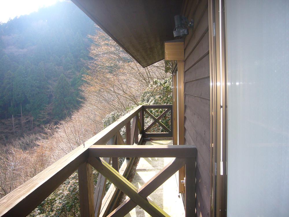 Balcony. The feeling of a good southeast side deck. By the way, shutters are electric shutter