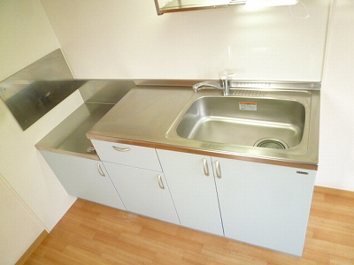Kitchen. There is also a sink widely cooking space. You can properly cuisine.