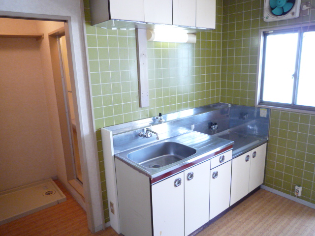 Kitchen. Next to have windows is bright kitchen