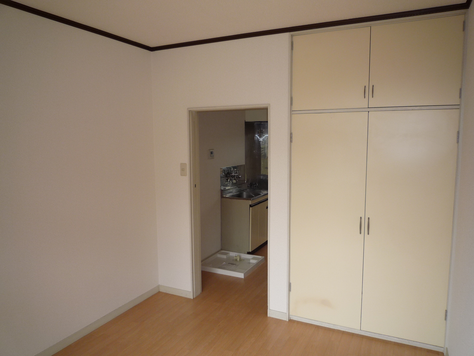 Living and room. Upper closet with storage space! 