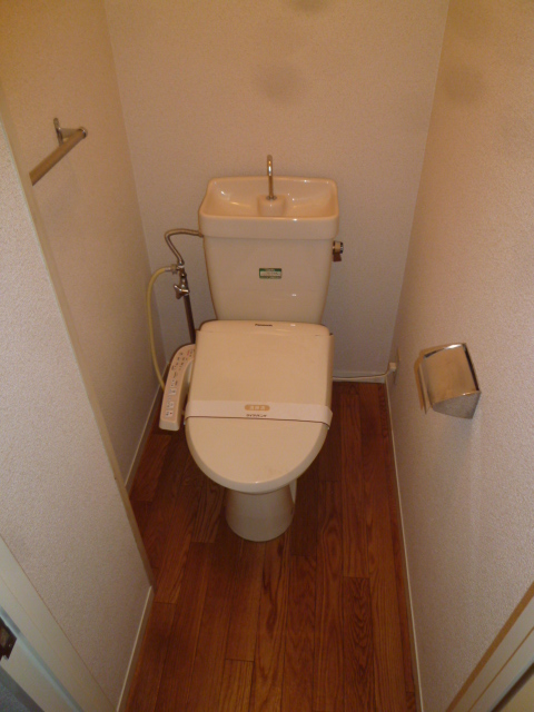 Toilet. With warm water washing toilet seat!